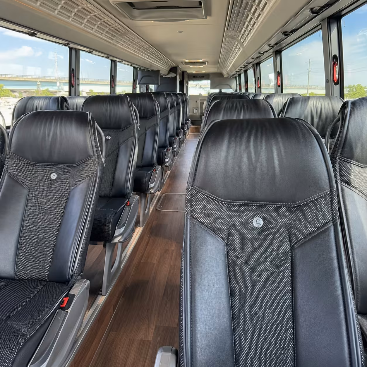 how trip distance and duration affect charter bus rental rates in edmond